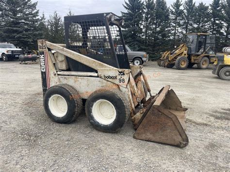 clark skid steer|bobcat 825 years made.